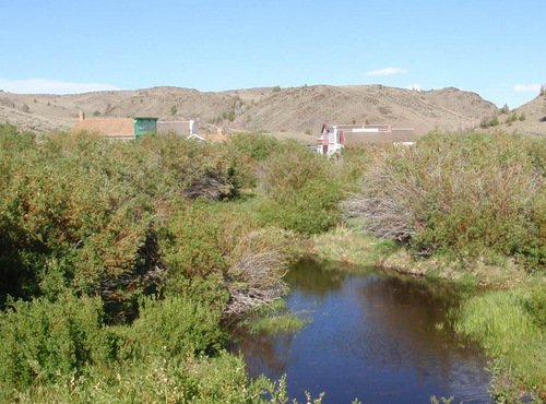 View looking east over a creek into the old town.